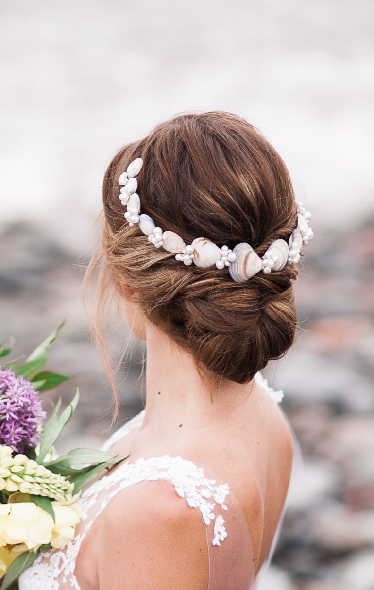 Bridal up-do is elevated with this freshwater pearl and seashell hair wreath. Bridal Hair Accessories. Bridal Accessories. Canadian Bridal Accessories. Handmade Canadian Accessories. Canadian handmade Accessories. Canadian weddings. Wedding Canada. Organic pearl accessories. Pearl Bridal Hair Accessories. Pearl Bridal Accessories.