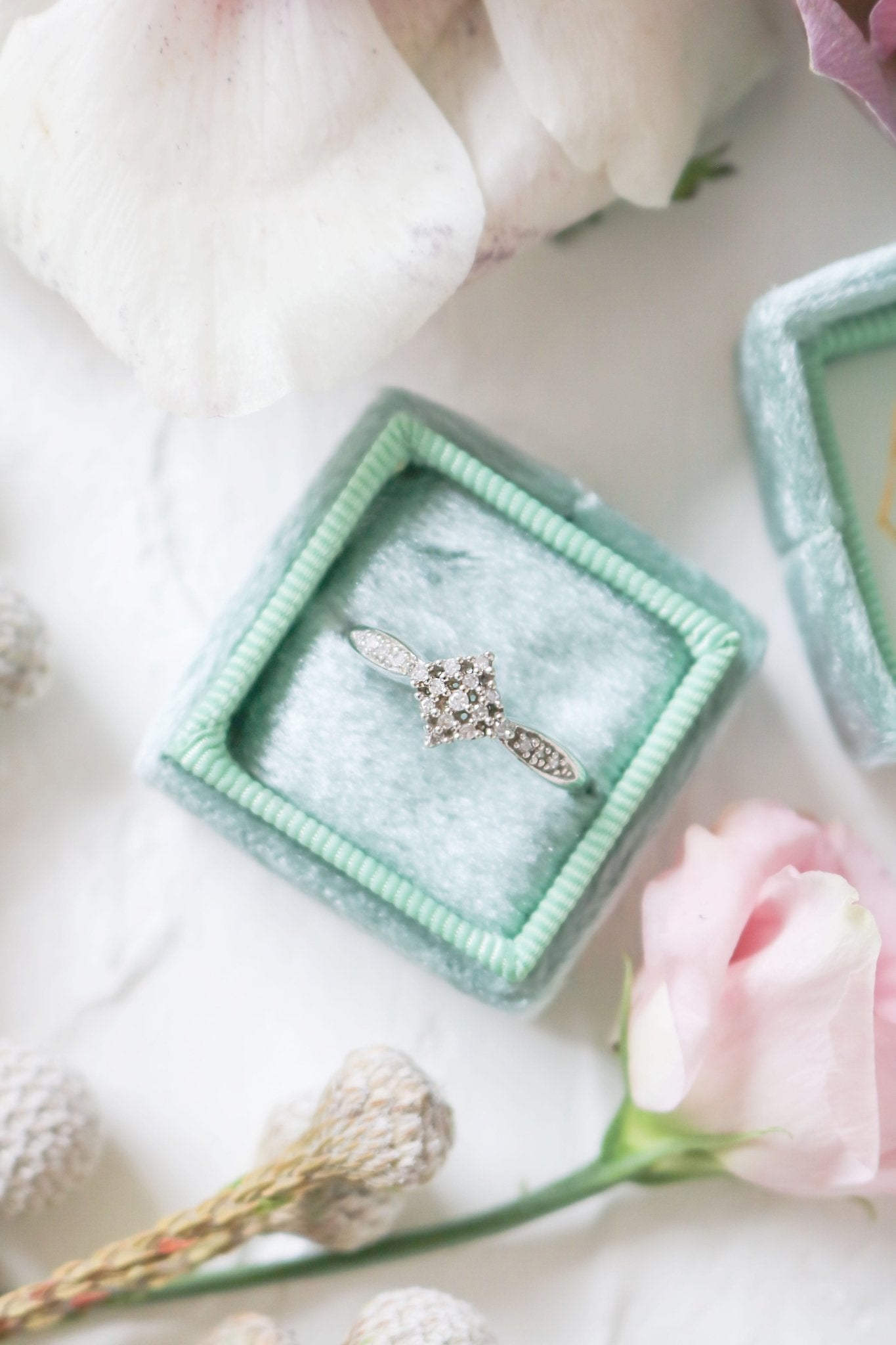 Adira Vintage Diamond Engagement Ring in 9ct White Gold in seafoam green engagement box. 