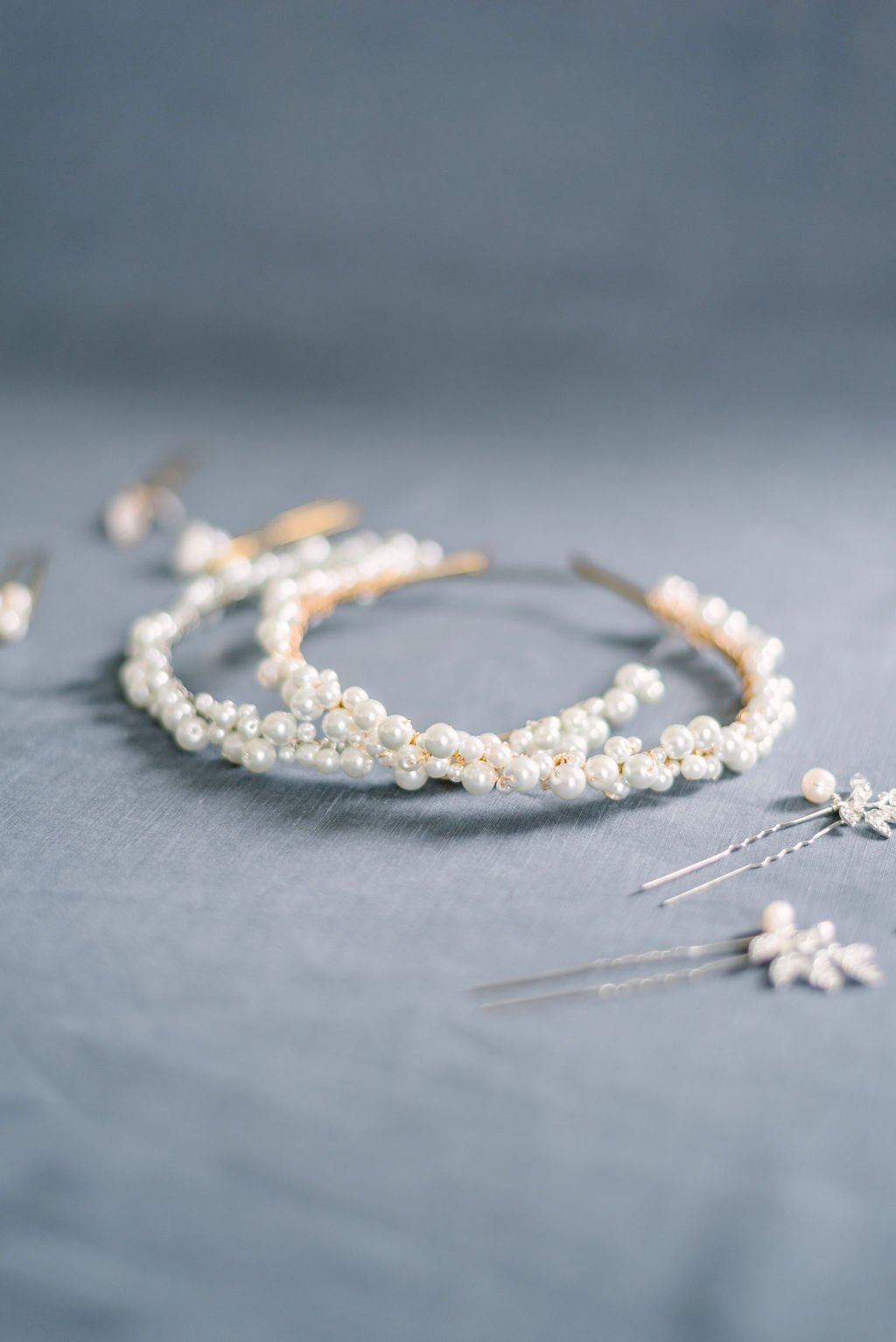 Allie Pearl Headbands in Gold and Silver with clusters of freshwater pearls surrounded by bridal hairpins.