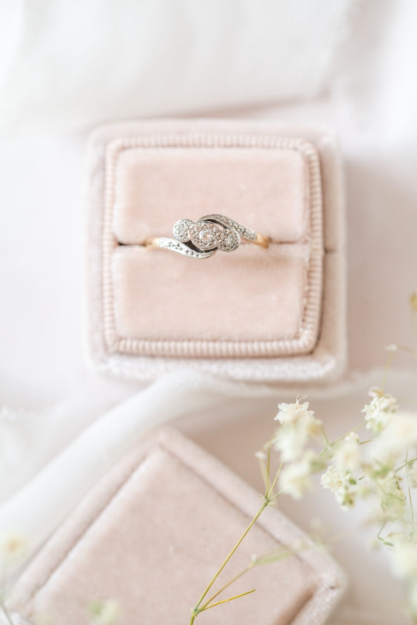 Unique Engagement Ring in 18k Gold and Platinum with Diamonds. Art Deco Style c.1930 sitting in a light blush ring box. 