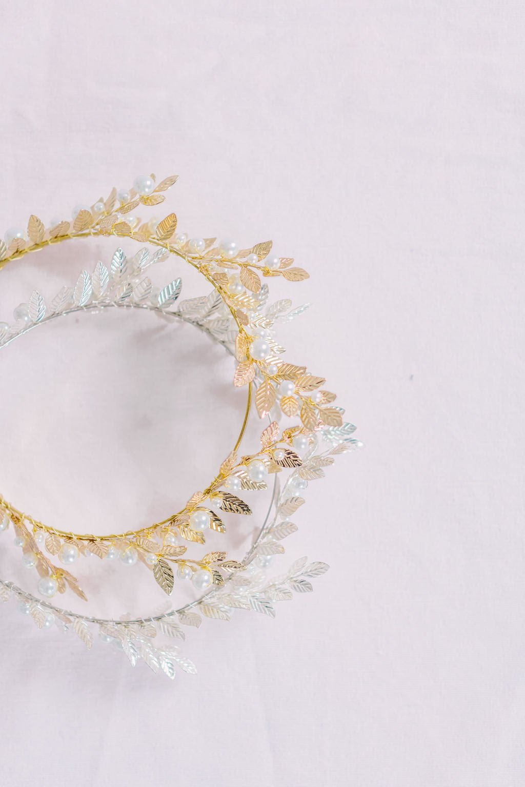 Two Artemis bridal hair accessories in gold and silver with freshwater pearls. 