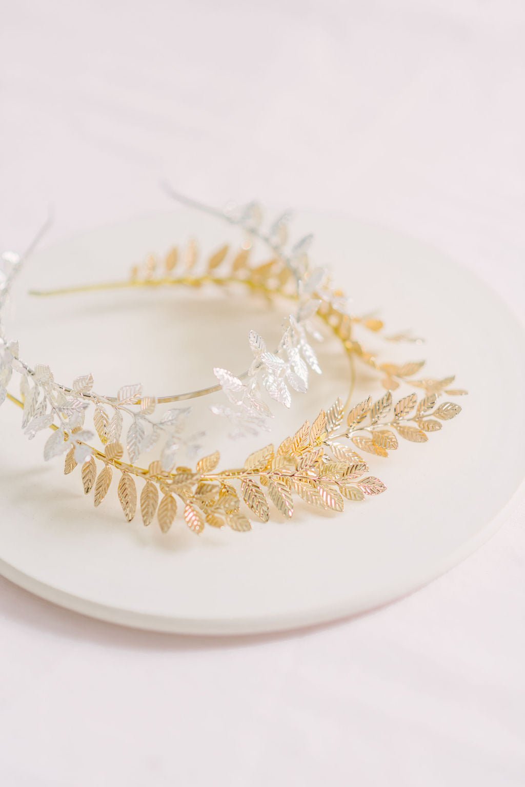 Goddess-like hair crowns with wire-wrapped laurel leaves. 