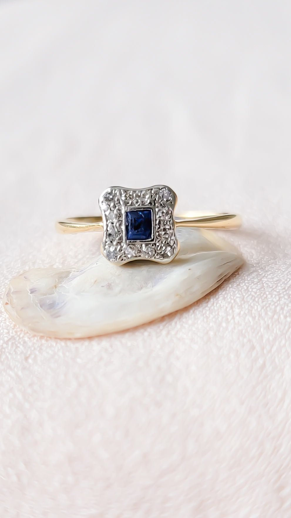 A 18k Yellow Gold and Platinum encrusted with Diamonds and an inset Sapphire Engagement Ring in Art Deco style. Canadian vintage engagement rings. Bridal jewelry Canada. Vintage engagement rings Canada. Canadian weddings. Wedding Canada. Woman-owned Canadian jewelry brand. Canadian jewelry business. Small Canadian jewelry brands. 