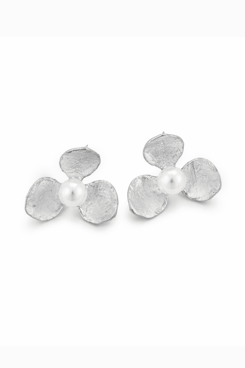 Sterling silver floral earrings with freshwater pearls on a white background. Sterling Silver jewelry handmade in Canada. Everyday jewelry & minimalist jewelry by Canadian jewelry artisan
