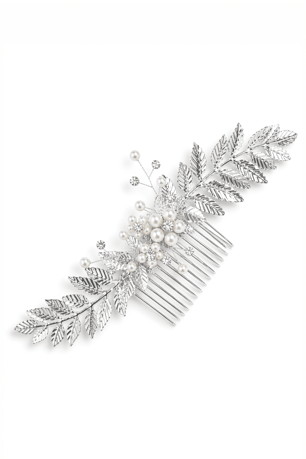 A silver bridal hair comb with pearls, crystals, and silver leaves lays on a white background. Affordable bridal accessories & bridal hair accessories handmade by Woman-owned Canadian bridal brand