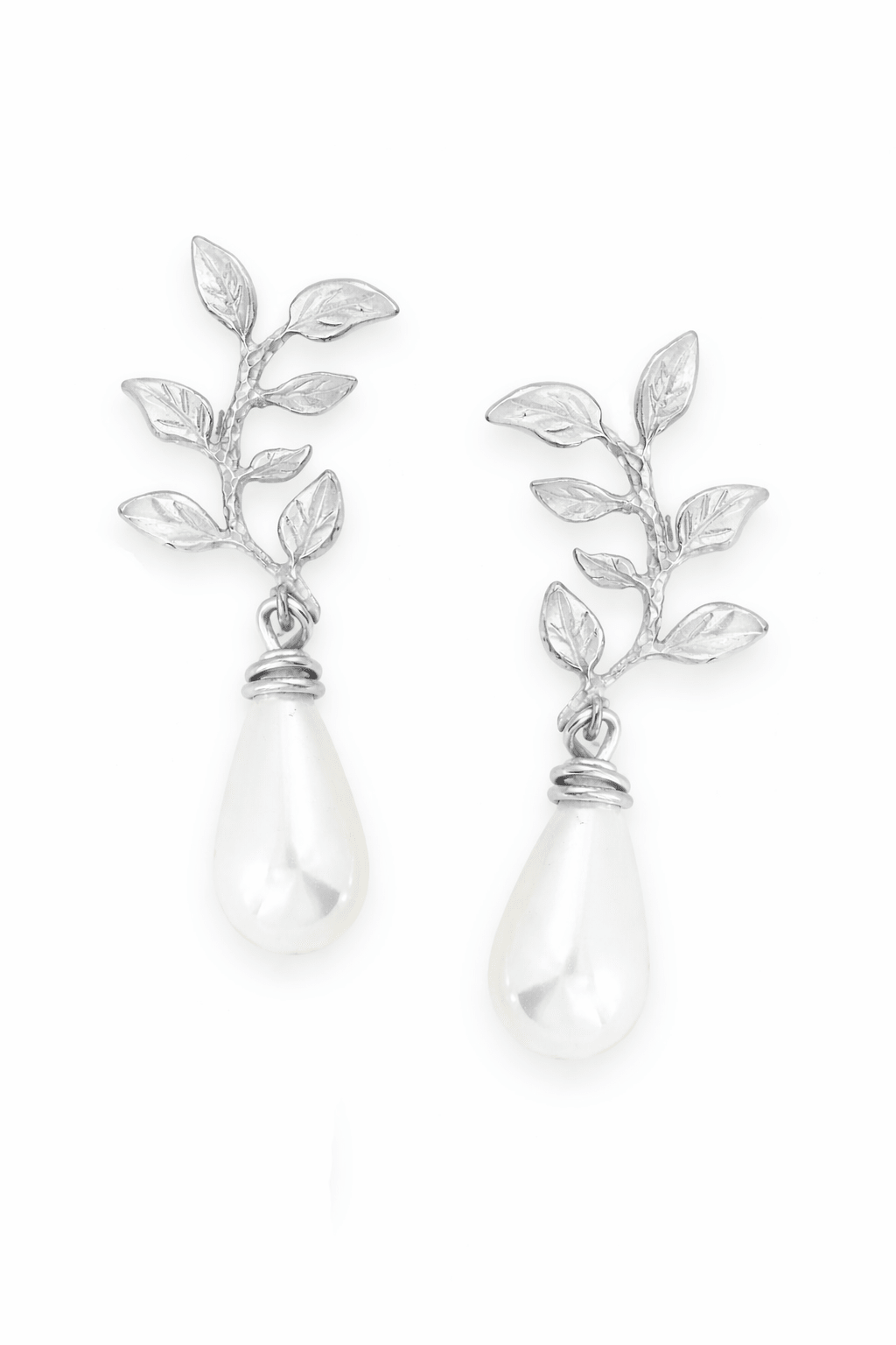 Sterling silver leaf bridal earrings with white freshwater pearls on a white background. Pearl bridal jewelry, sterling silver jewelry, & affordable bridal jewelry handmade by Canadian jewelry designer