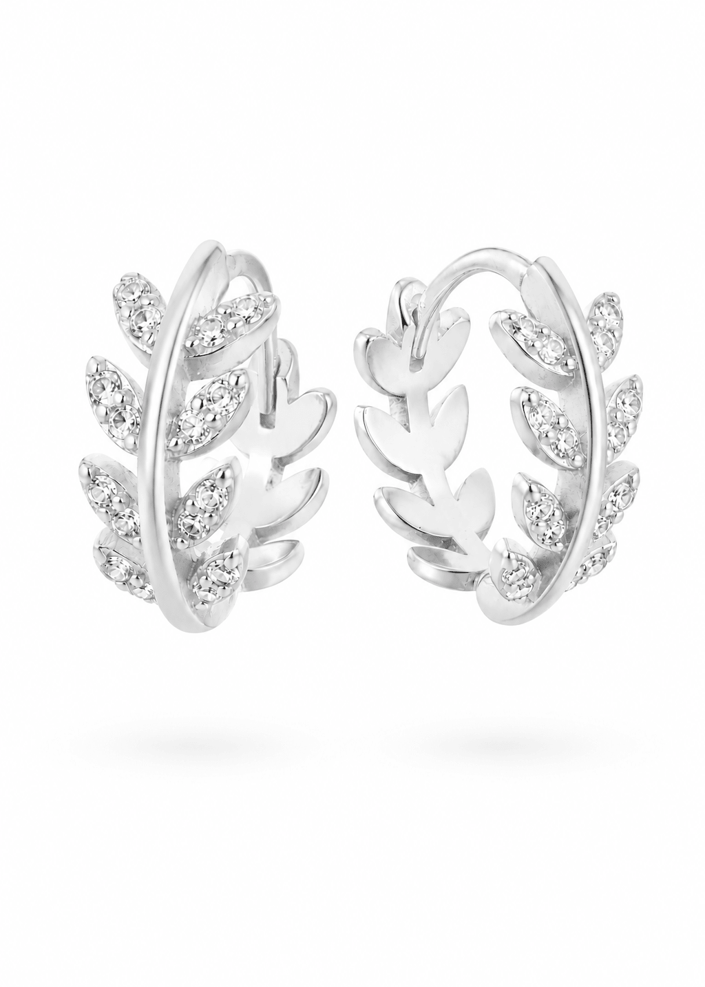 Sterling silver hoop earrings with laurel leaf designs and cubic zirconia crystals on a white background. Handmade silver hoop earrings by Canadian jewellery artist