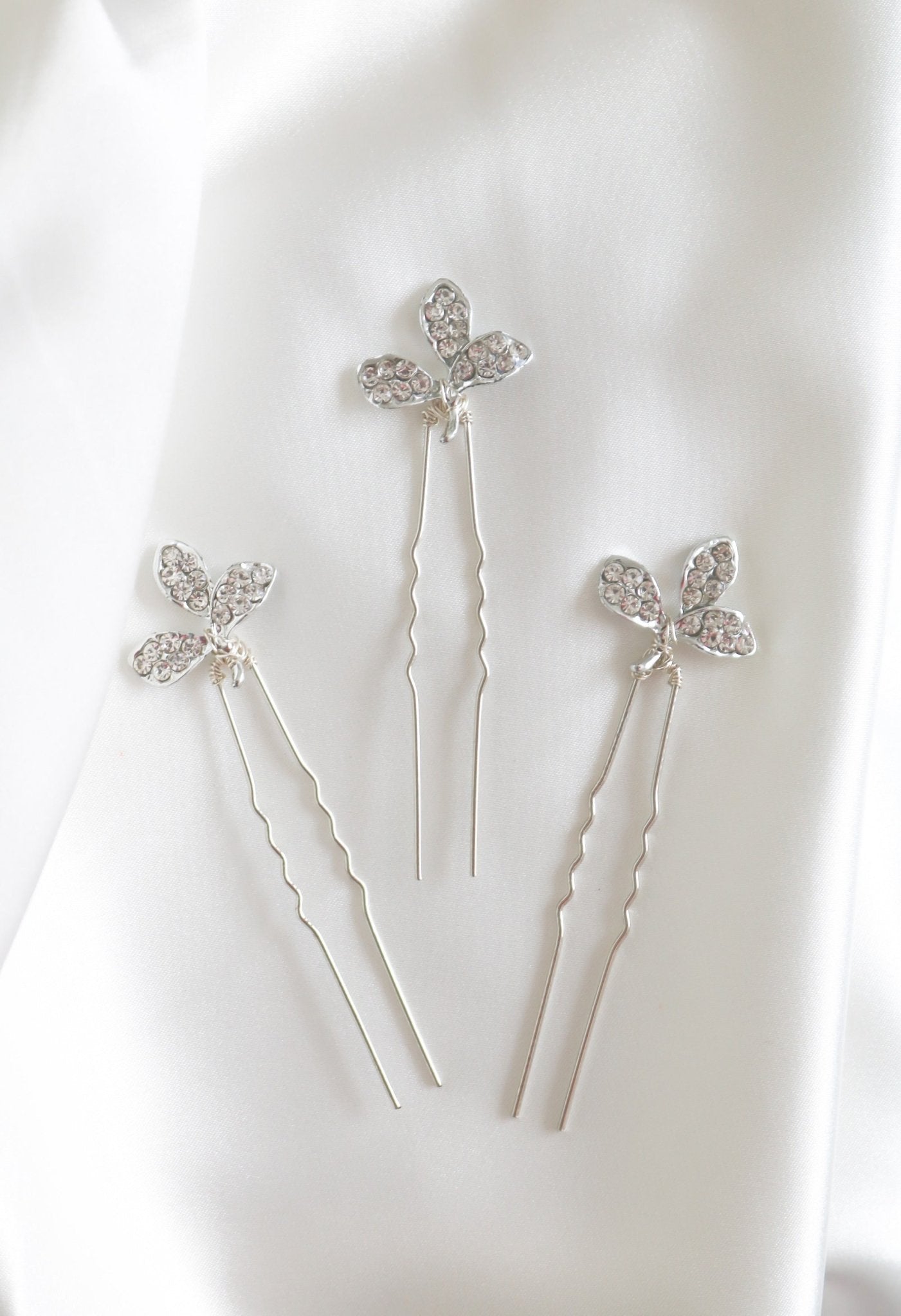 Bridal hairpins with crystal leaves and sterling silver.