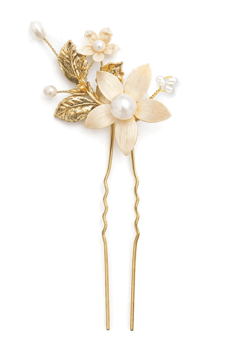 Gold bridal hairpin with enameled floral design and freshwater pearls on a white background. Pearl Bridal Hair Accessories made by Woman-owned Canadian jewelry brand.