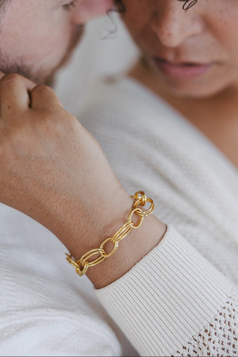 Woman wearing the large link gold-filled Girlfriend Chain bracelet. Gold-filled jewelry Canada.