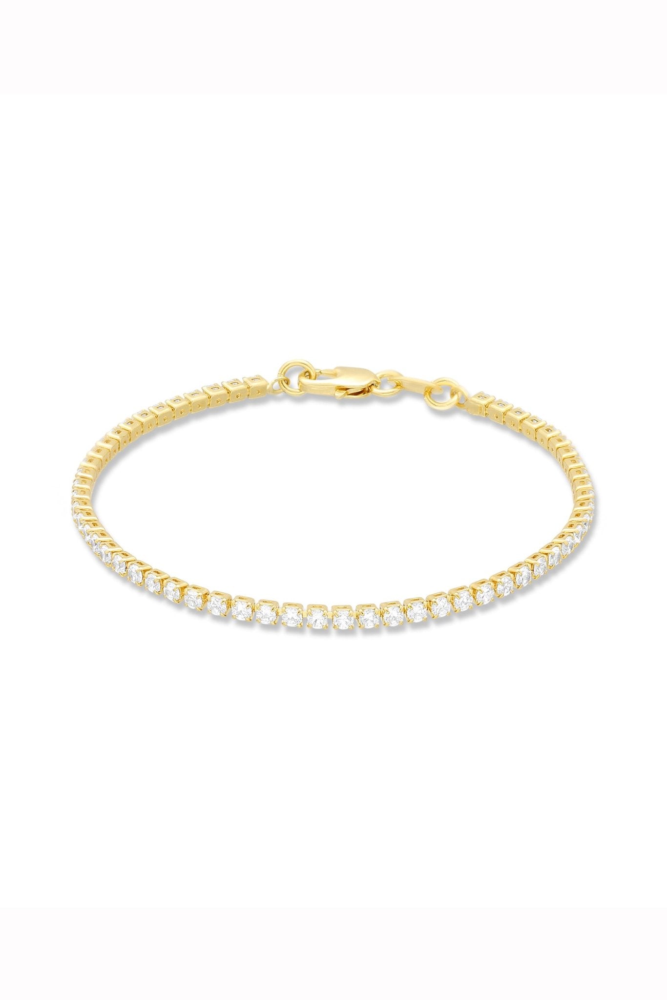 A gold-filled tennis bracelet with cubic zirconia crystals. Canadian jewelry brand. Gold jewelry Canada.