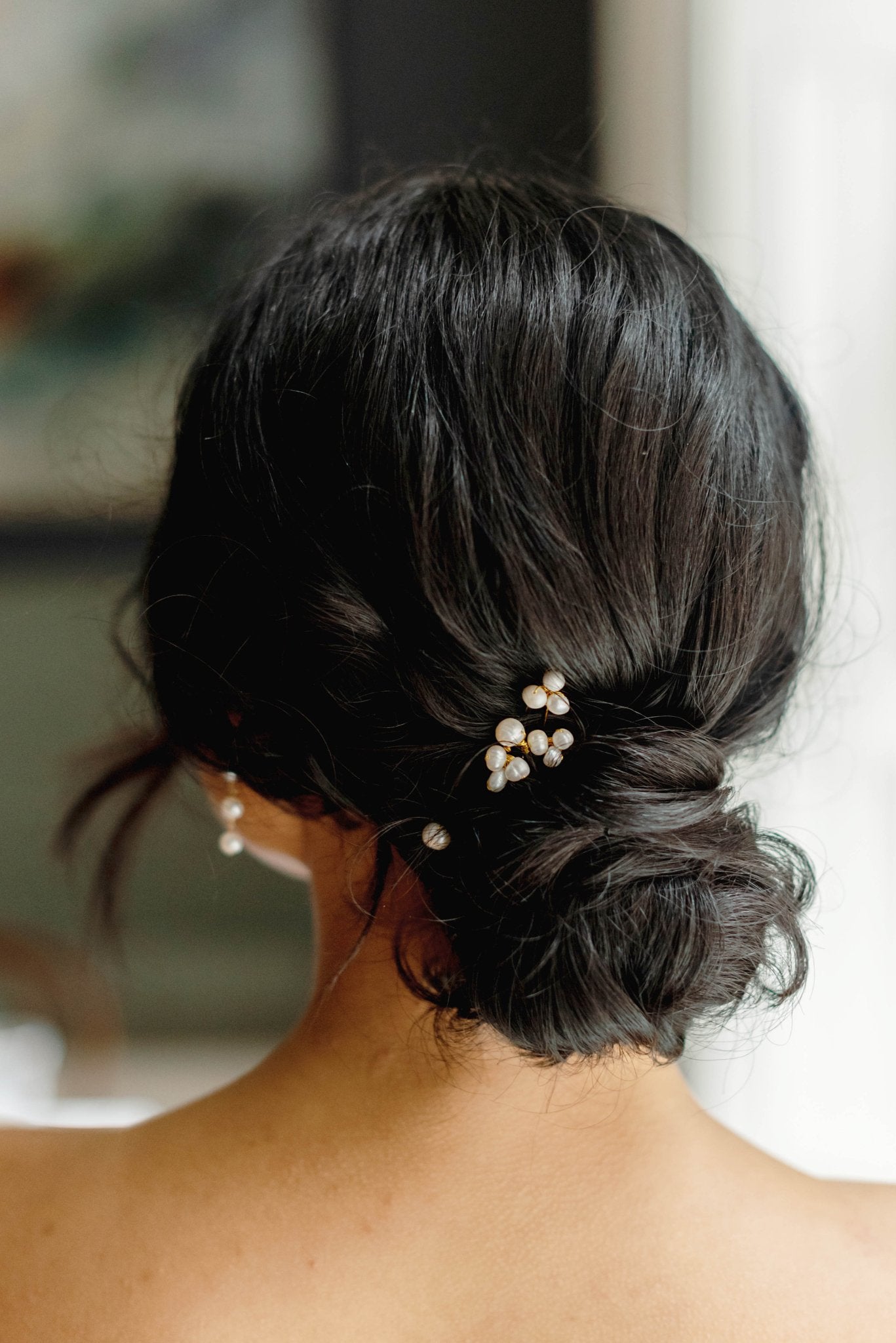 Hayley Fresh Water Pearl Bridal Hairpins set in a bridal bun. 