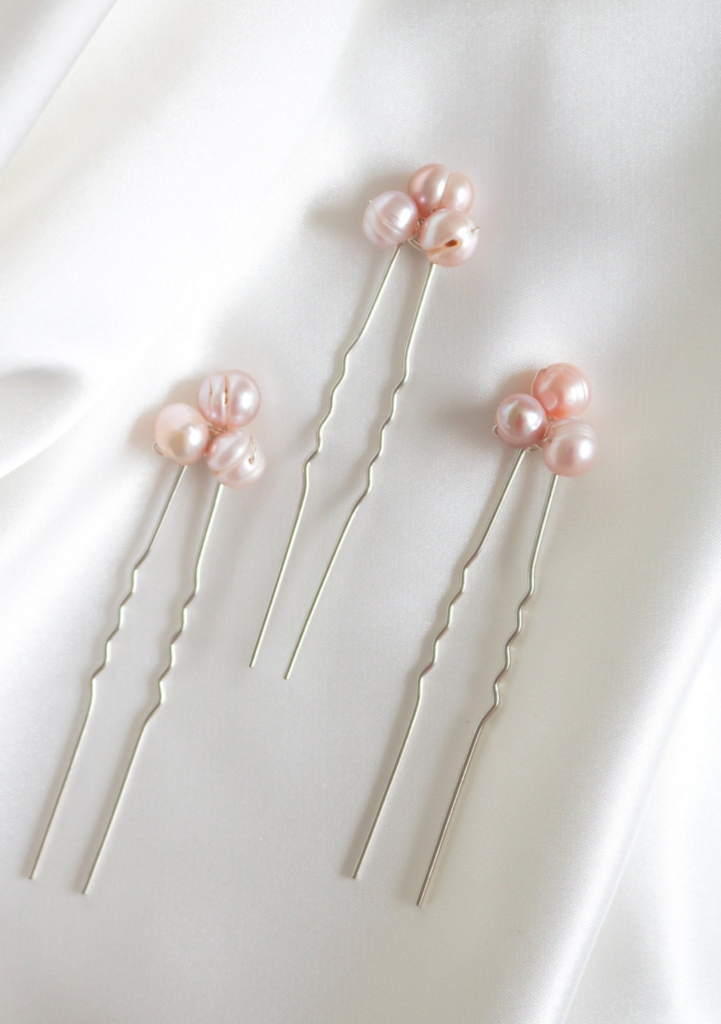 Three Silver Hayley Fresh Water Pearl Hairpin in Blush on a white background. 