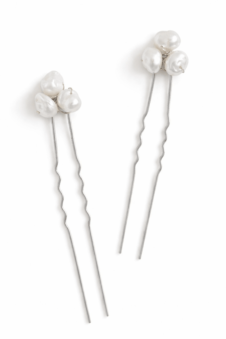 Three Philippine freshwater pearls on bridal hairpins with white background. Handmade Canadian bridal accessories made by  Canadian jewelry designer.