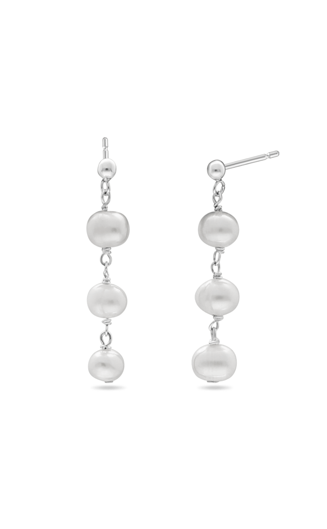 A pair of Sterling Silver freshwater pearl dangle earrings. Bridal jewelry Canada. Pearl jewelry Canada. Pearl Bridal jewelry Canada. Sterling Silver jewelry Canada. Canadian jewelry business. Organic pearl jewelry. Handmade Canadian jewelry.