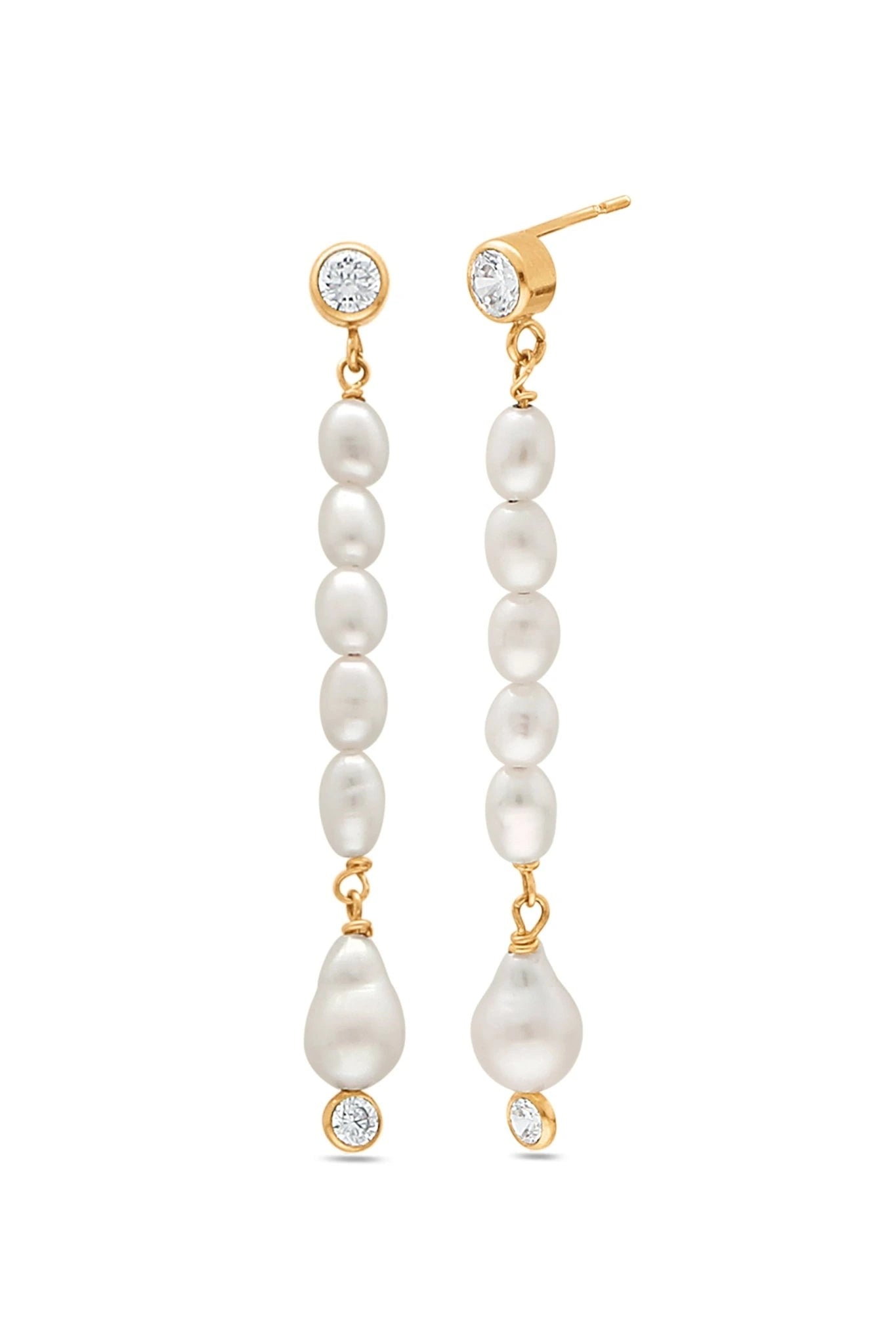 A pair of Gold-filled freshwater pearl drop bridal earrings with crystals on white background. Handmade pearl bridal jewelry & pearl bridal earrings by BIPOC bridal designer