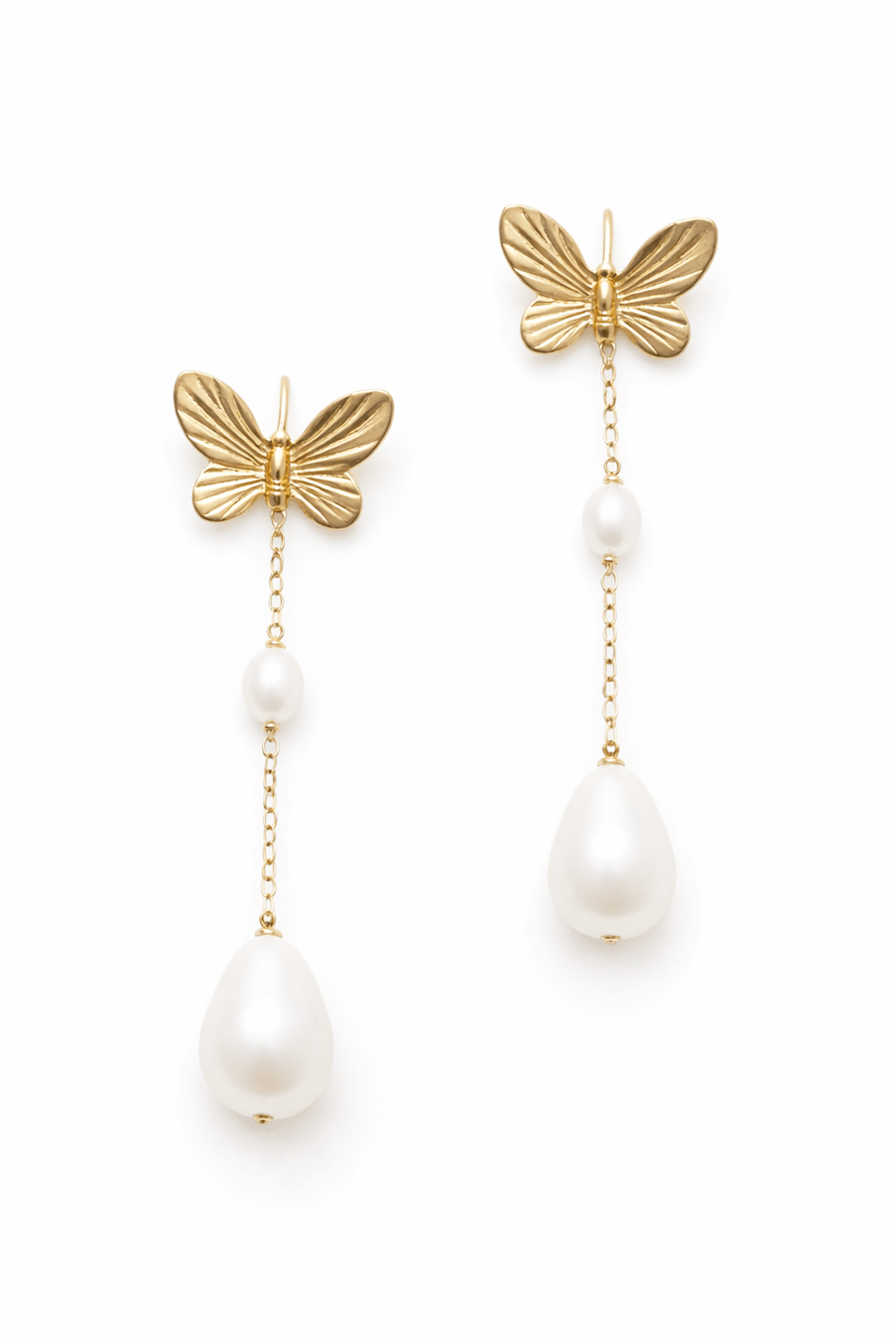 Gold butterfly earrings with freshwater pearl drops on a white background. Bridal earrings for Canadian weddings. Pearl Bridal jewelry and Gold-filled jewelry made by Woman-owned Canadian jewelry brand.