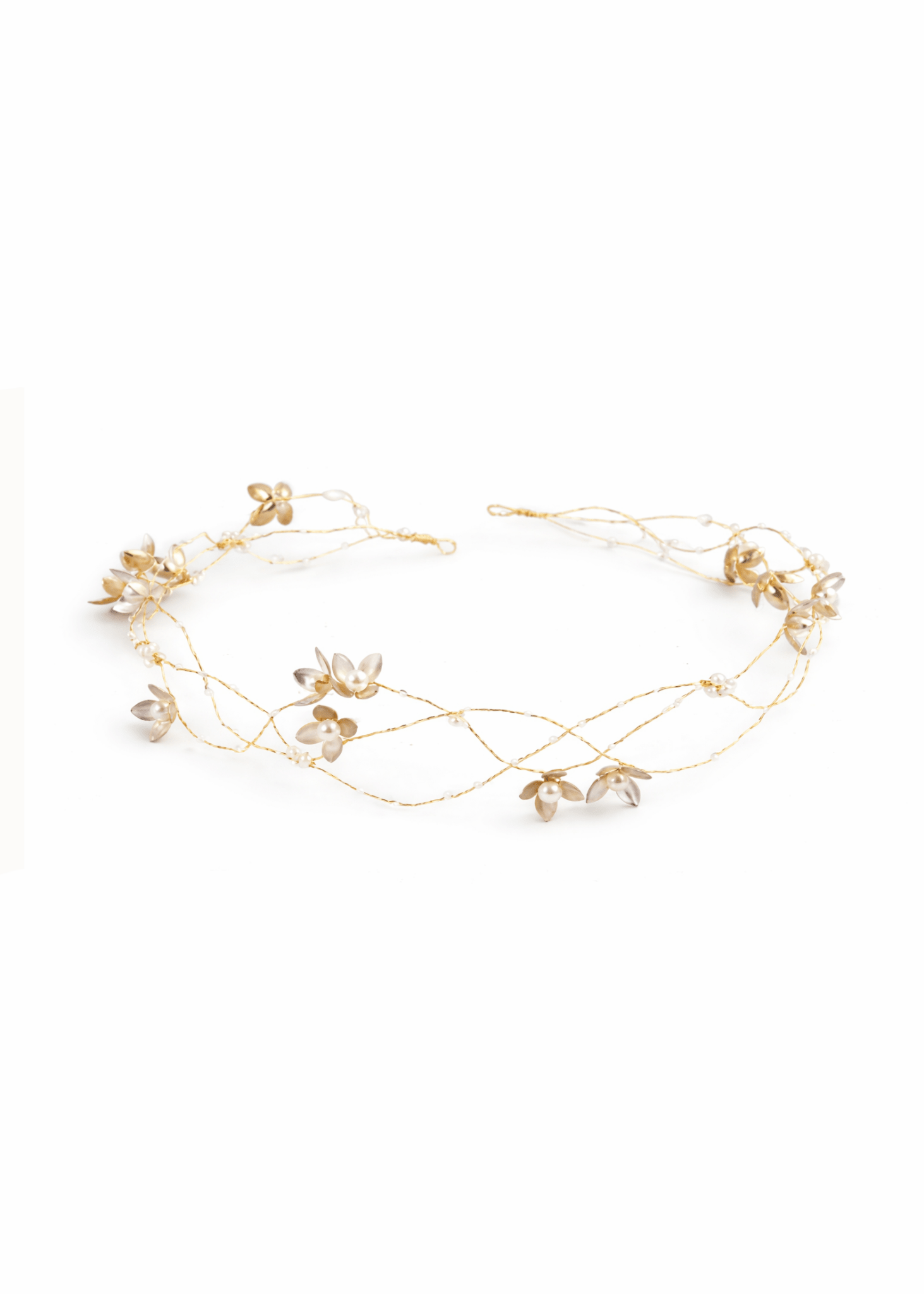 Gold Bridal Hairvine with floral elements and freshwater pearls on a white background. Bridal jewelry Canada. Canadian weddings. Canadian jewelry business. Bridal Hair Accessories. Pearl Bridal Accessories. Canadian bridal jewelry