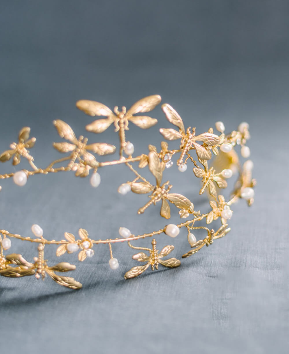 A gold freshwater pearl bridal crown with dragonflies.