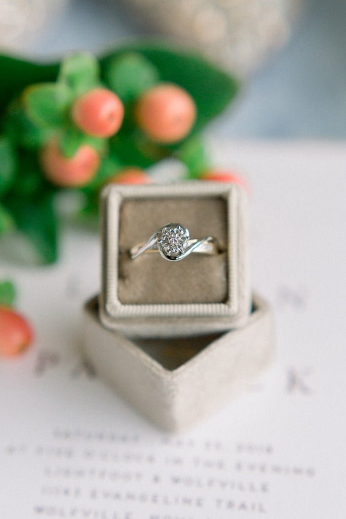 Top view of the Swan Diamond Vintage Engagement Ring in 10k Yellow & White Gold in ring box. 