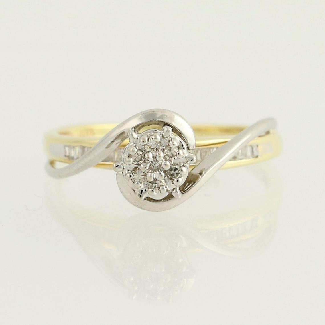 Extreme close up of the front of the Swan Diamond Vintage Engagement Ring in 10k Yellow & White Gold.