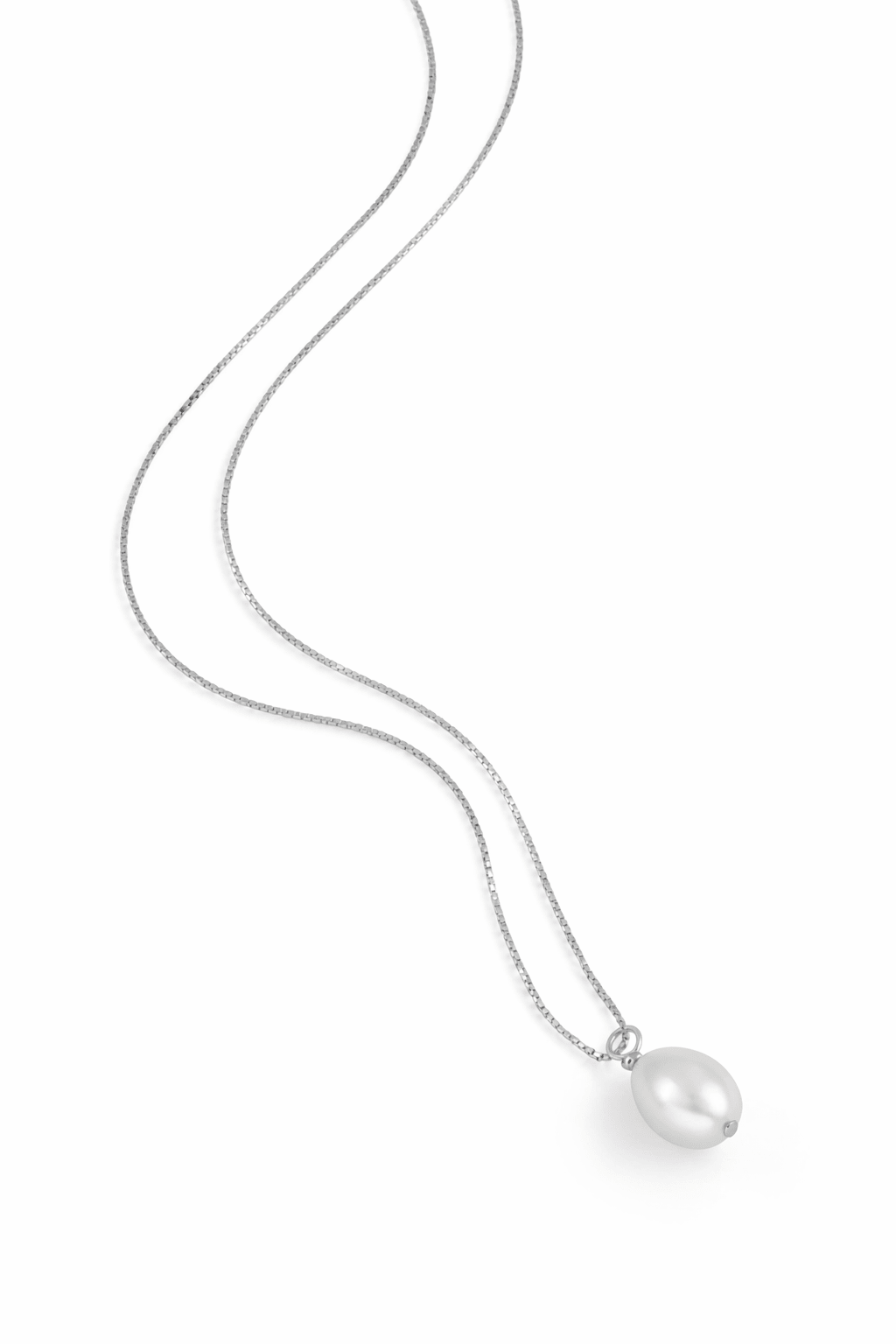 Dainty sterling silver box chain necklace with organic freshwater pearl on white background. Freshwater pearl necklace, everyday jewelry, & pearl jewelry Canada