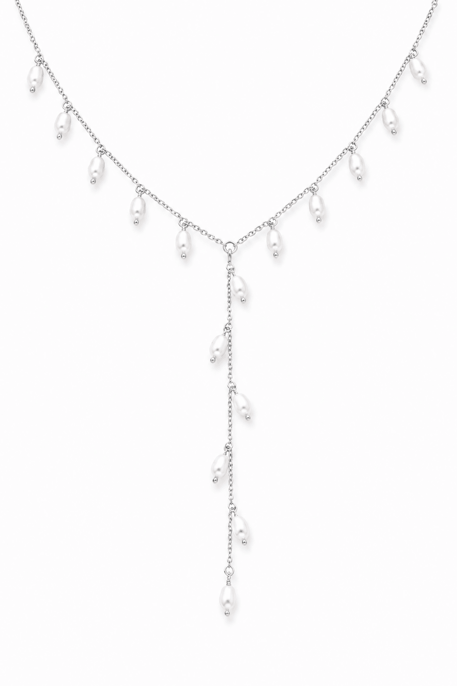 Sterling silver fresh water pearl drop lariat style necklace on white background. Handmade pearl necklace by Canadian jewellery artist