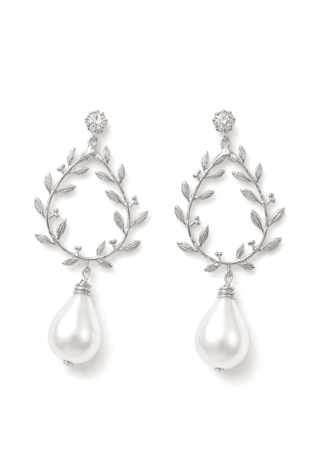 Pair of silver earrings with laurel leaf designs and pearl drops on a white background, made for brides in canada