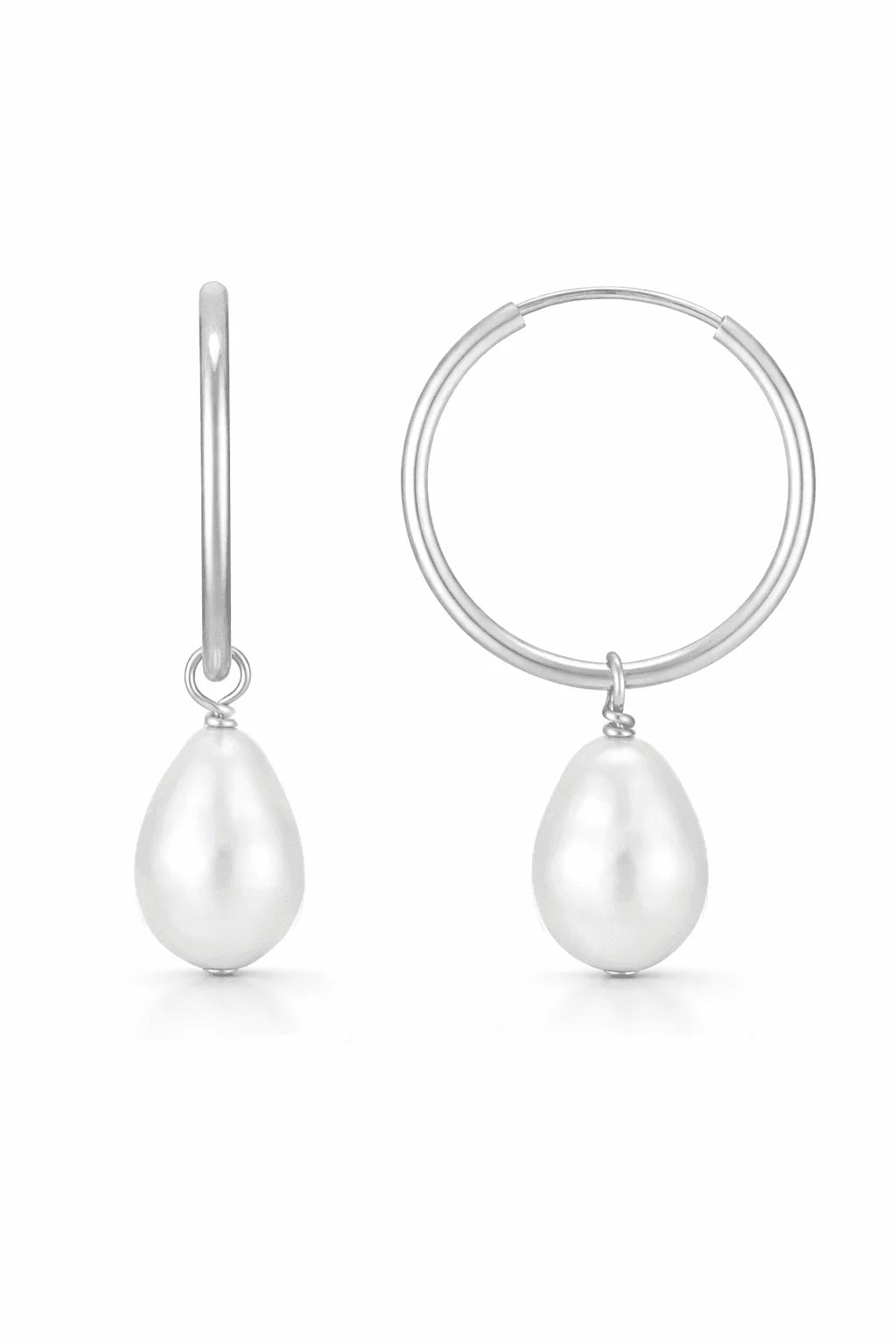 A pair of fresh water pearl earrings in sterling silver on a white background.  Sterling silver jewelry & handmade Canadian jewelry from affordable Canadian jewelry brand